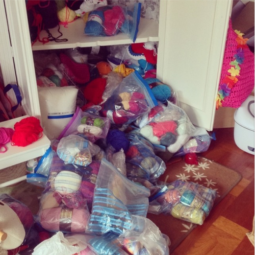 Yarn pouring out of the cubpoard