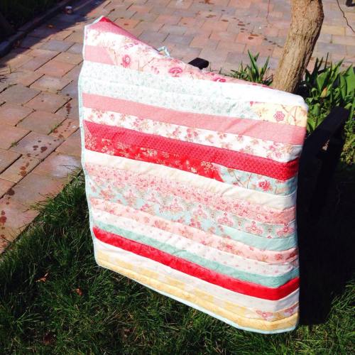 My first ever Jelly Roll Race Quilt