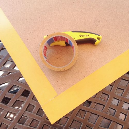 stick the double sided tape down ready to apply the wallpaper