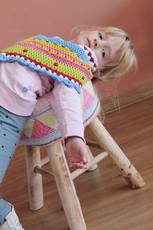 Tapestry crochet stool, modelled by Raina