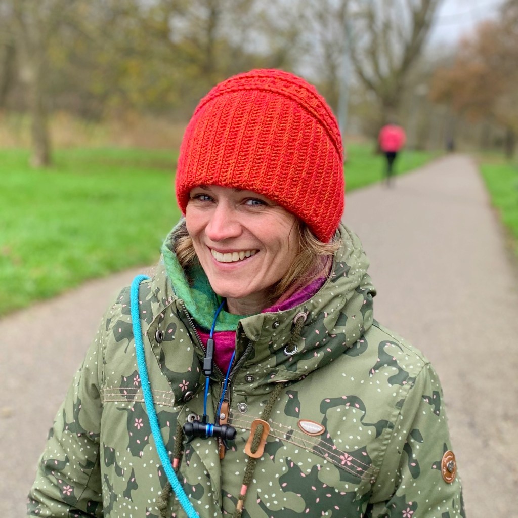 Close up image of woman wearing crochet hat